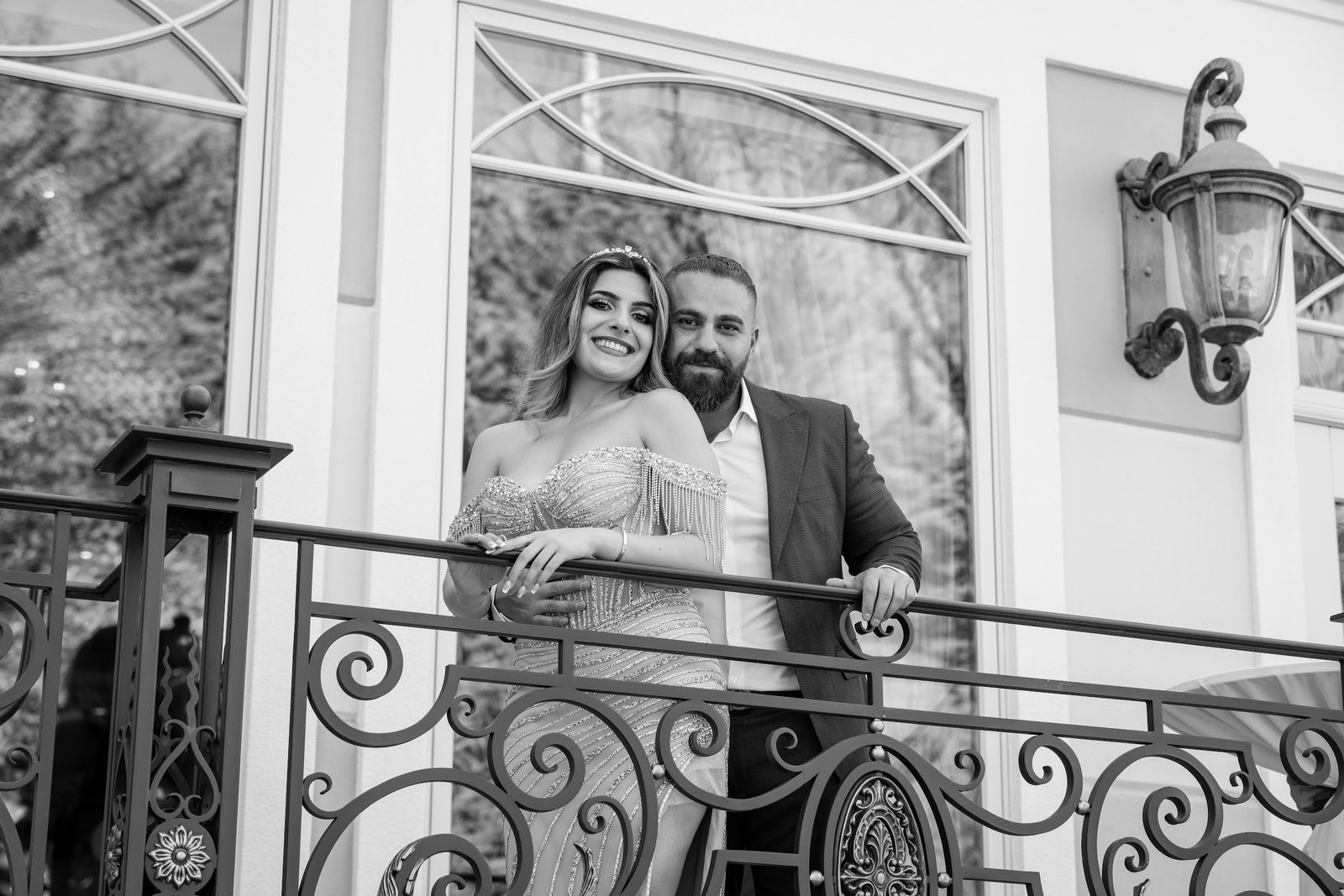 Black and white photograph of the couple on the balcony